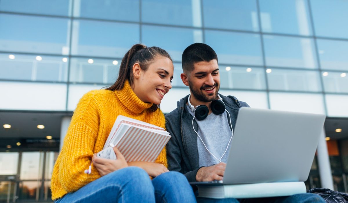 Students,Using,Laptop,Computer,Outdoor,In,School,Campus